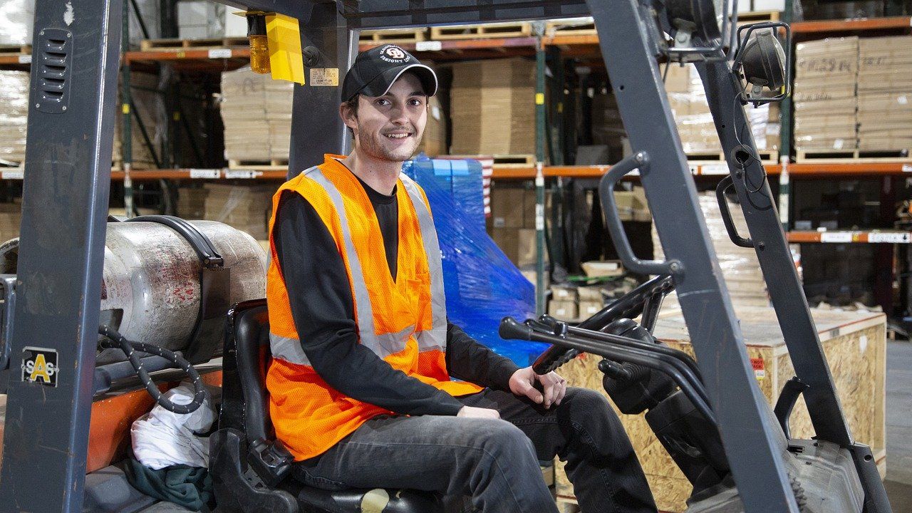 Warehouse professional operating a forklift